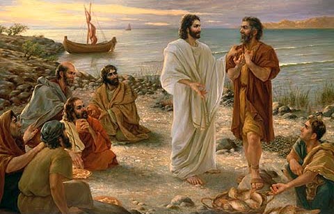 Jesús, reparte panes y pescado